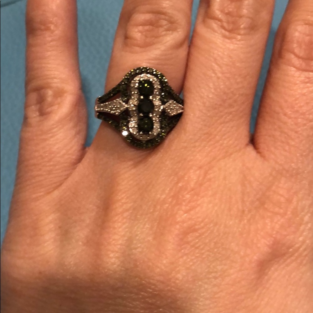 Green and white diamond ring